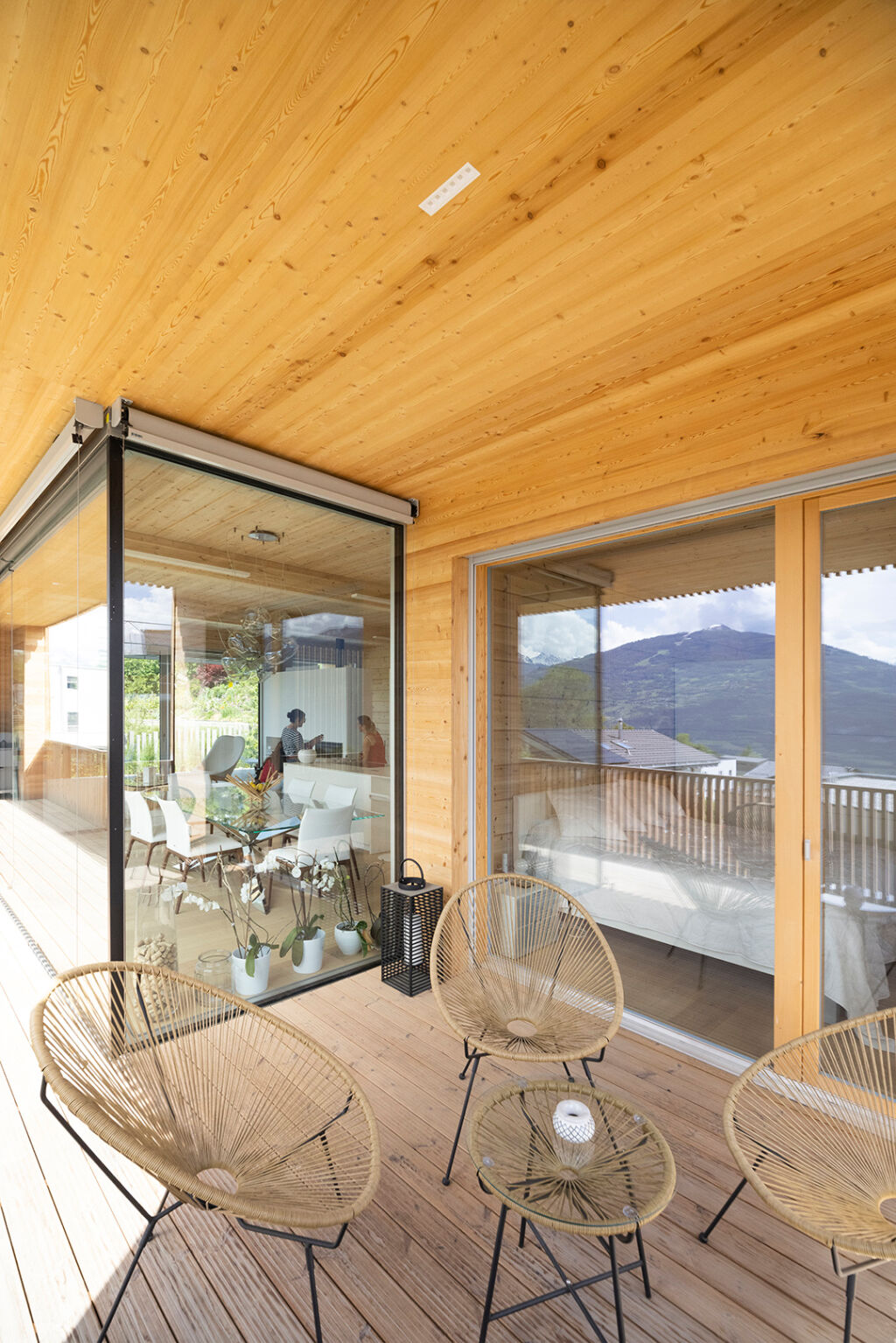 Modern log home in the swiss alps exterior balcony
