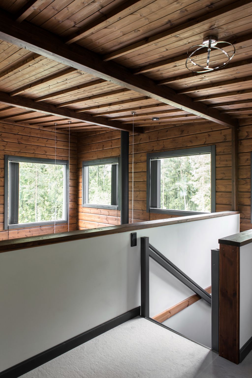The living room opens up all the way to the ceiling