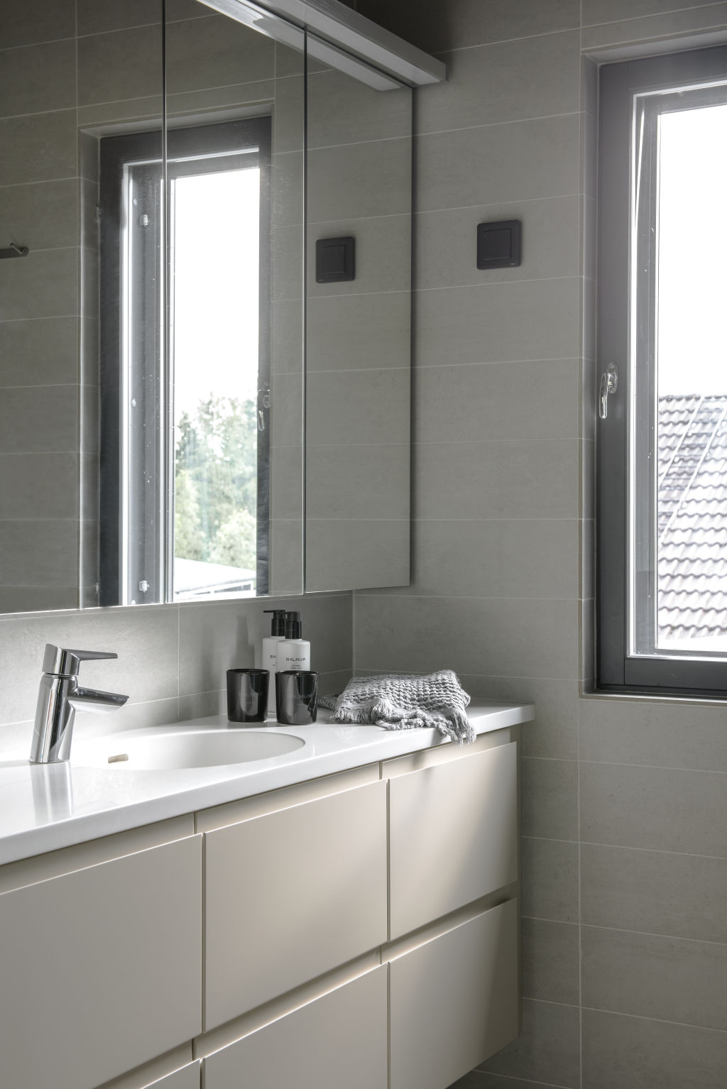 The upstairs bathroom is furnished with Kontio Living range of a white coffee shade.